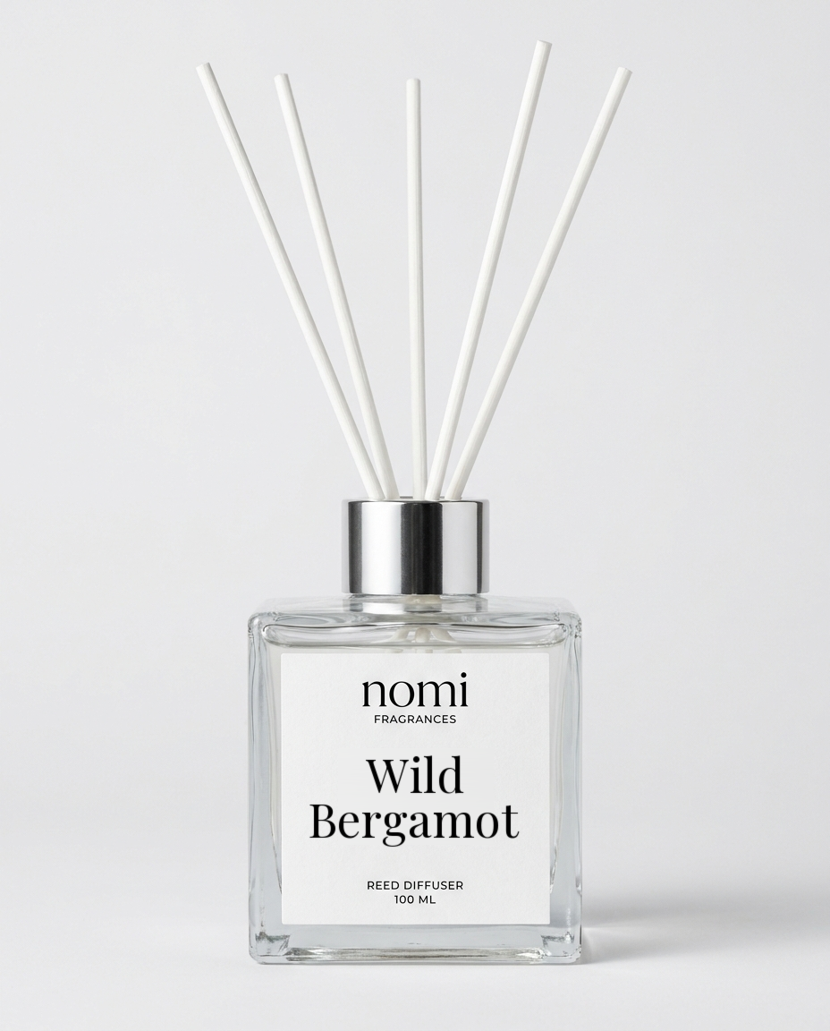 Wild Bergamot reed diffuser, 100ml clear glass bottle with silver cap and white reeds